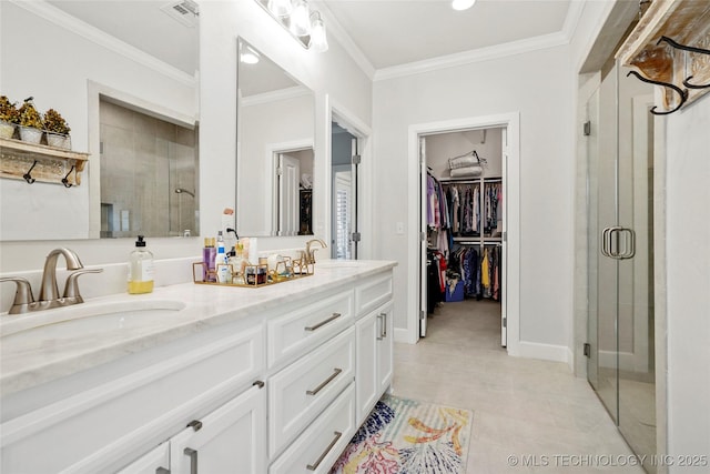 5314 E 126th St S, Bixby, OK 74008 - full bathroom with a stall shower, double vanity, a walk in closet, ornamental molding, and tile patterned flooring