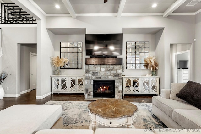 524 N 85th St, Broken Arrow, OK 74014 - living room featuring wood finished floors, beamed ceiling, a stone fireplace, recessed lighting, and crown molding