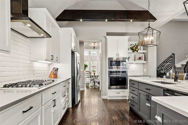524 N 85th St, Broken Arrow, OK 74014 - kitchen featuring stainless steel appliances, custom exhaust hood, a chandelier, light countertops, and white cabinetry