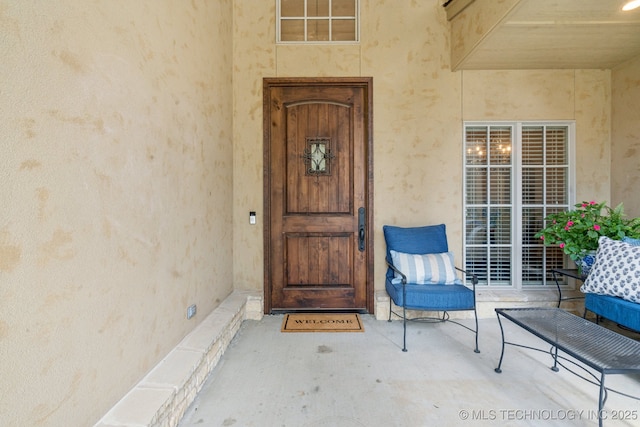 9545 E 108th St S, Bixby, OK 74133 - view of exterior entry featuring stucco siding