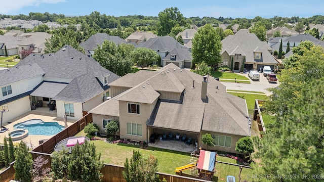 9545 E 108th St S, Bixby, OK 74133 - aerial perspective of suburban area featuring a pool area