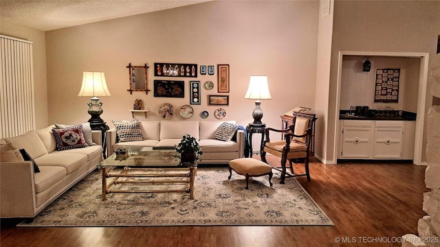 4224 E 84th St, Tulsa, OK 74137 - living room featuring wood finished floors and bar area