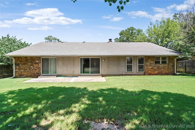 4224 E 84th St, Tulsa, OK 74137 - back of house with stone siding, a patio, and roof with shingles