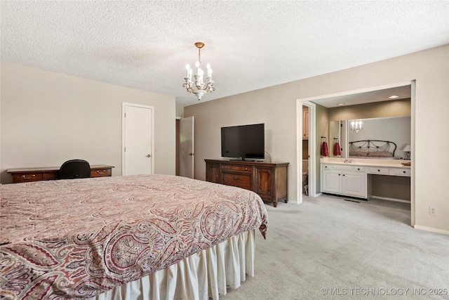 4224 E 84th St, Tulsa, OK 74137 - bedroom featuring a chandelier, light carpet, ensuite bathroom, and a textured ceiling