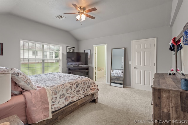 420 W 54th St, Sand Springs, OK 74063 - carpeted bedroom featuring lofted ceiling, ensuite bath, and a ceiling fan
