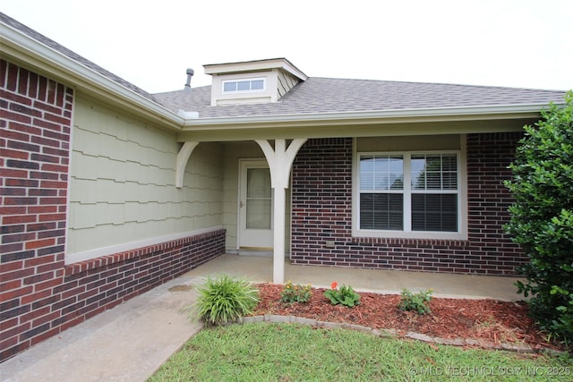 14313 E 112th Pl, Owasso, OK 74055 - entrance to property featuring brick siding and a shingled roof