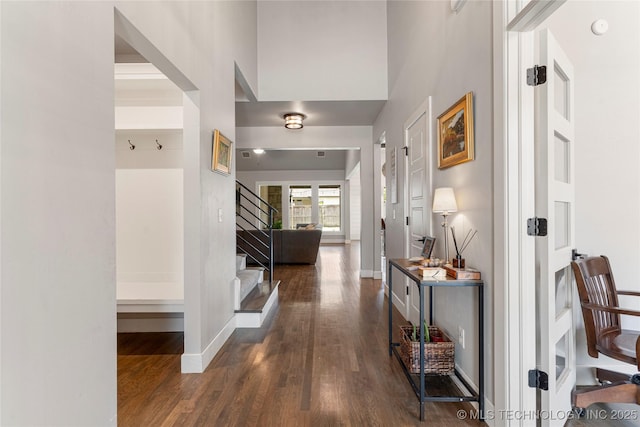 10470 E 123rd Pl S, Bixby, OK 74008 - entryway featuring stairway, dark wood-style flooring, and a high ceiling