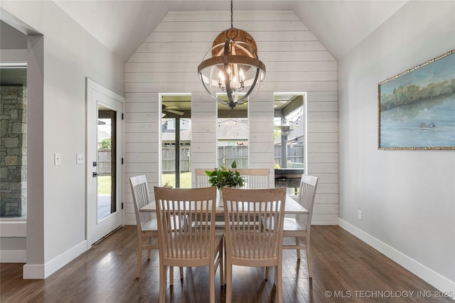 10470 E 123rd Pl S, Bixby, OK 74008 - dining area with vaulted ceiling, a chandelier, wood finished floors, and wood walls
