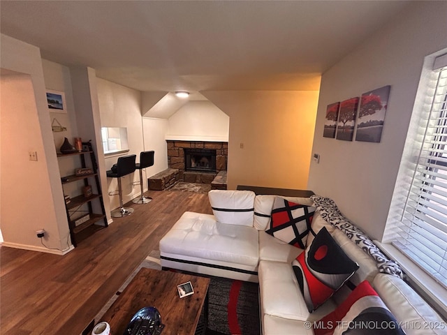 3402 S Winston Ave Unit 103, Tulsa, OK 74135 - living area with wood finished floors and a stone fireplace