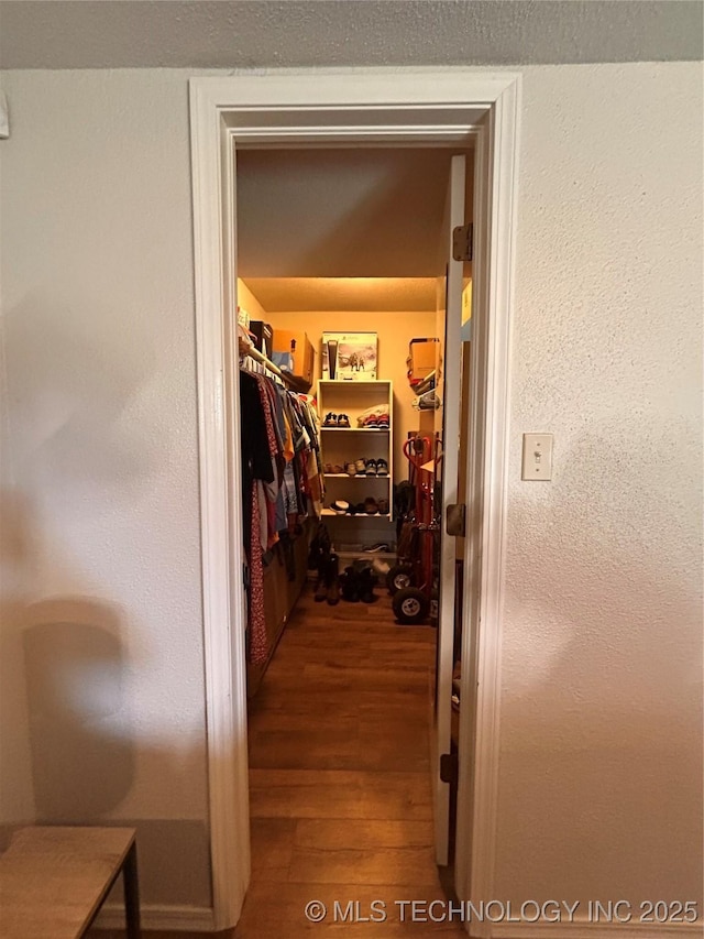 3402 S Winston Ave Unit 103, Tulsa, OK 74135 - walk in closet with wood finished floors