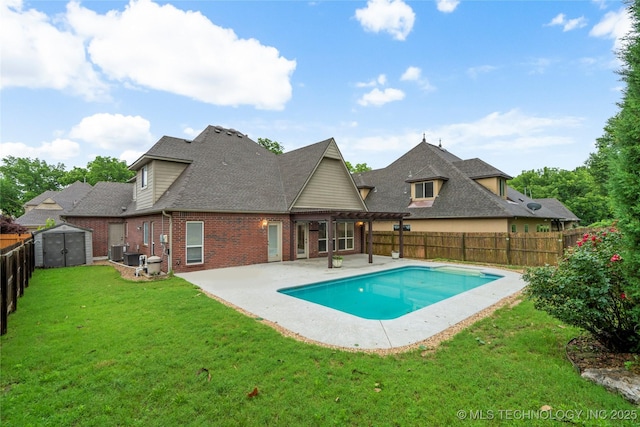 9722 S 75th E Ave, Tulsa, OK 74133 - view of pool with a fenced backyard, a shed, and a patio area