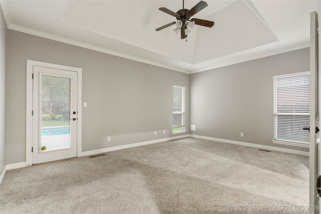 9722 S 75th E Ave, Tulsa, OK 74133 - carpeted empty room featuring a ceiling fan, ornamental molding, and healthy amount of natural light