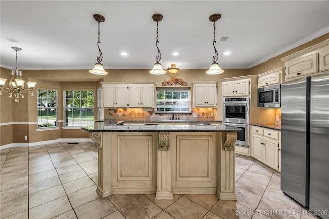 4405 Ithica St, Broken Arrow, OK 74012 - kitchen with appliances with stainless steel finishes, healthy amount of natural light, backsplash, a center island, and ornamental molding
