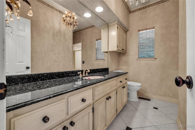 4405 Ithica St, Broken Arrow, OK 74012 - bathroom with vanity, a chandelier, and tile patterned flooring
