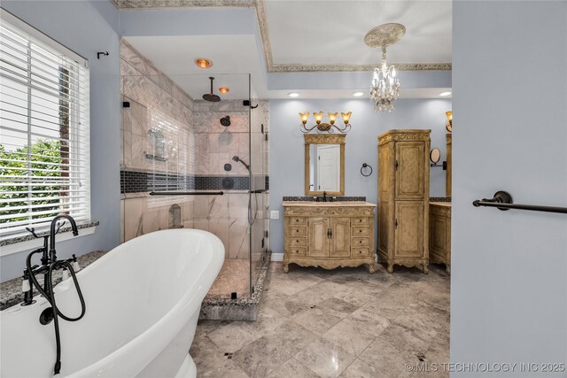 4405 Ithica St, Broken Arrow, OK 74012 - full bath with a stall shower, a chandelier, vanity, and a freestanding bath