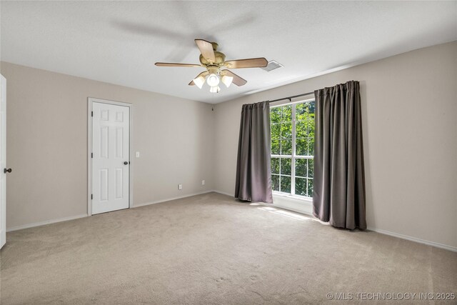 4405 Ithica St, Broken Arrow, OK 74012 - unfurnished room featuring carpet flooring and a ceiling fan