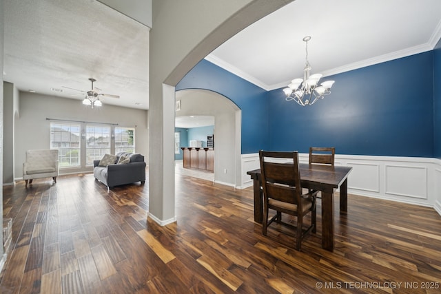 4770 S 204th E Ave, Broken Arrow, OK 74014 - dining area with arched walkways, ceiling fan, a chandelier, dark wood-style floors, and crown molding