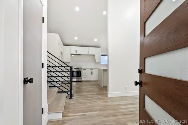 2936 E 75th St, Tulsa, OK 74136 - foyer entrance featuring light wood-style flooring, recessed lighting, and stairs