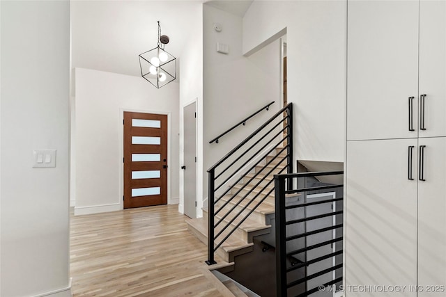 2936 E 75th St, Tulsa, OK 74136 - foyer entrance with light wood-style flooring and baseboards