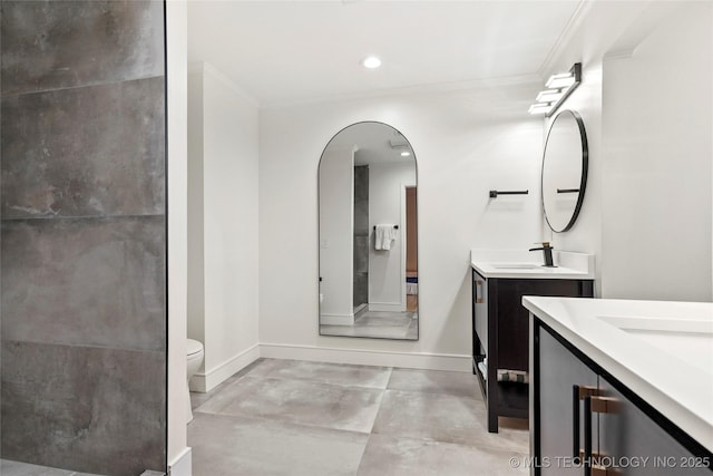 2936 E 75th St, Tulsa, OK 74136 - bathroom with crown molding, two vanities, recessed lighting, and a shower
