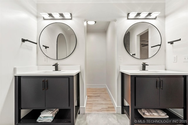 2936 E 75th St, Tulsa, OK 74136 - full bath with two vanities and wood finished floors