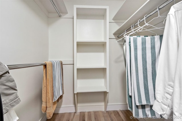 2936 E 75th St, Tulsa, OK 74136 - spacious closet featuring wood finished floors