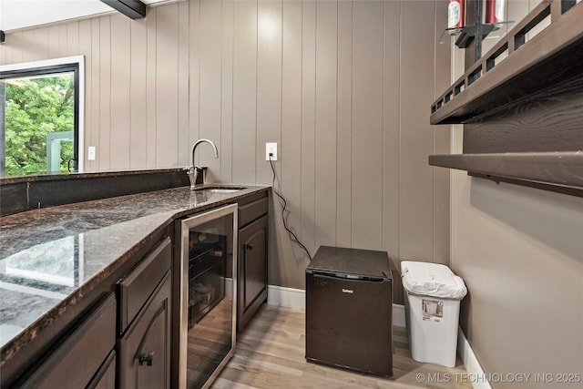 2936 E 75th St, Tulsa, OK 74136 - indoor wet bar featuring beverage cooler, refrigerator, and light wood-type flooring