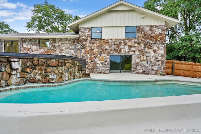 2936 E 75th St, Tulsa, OK 74136 - view of swimming pool with a patio area