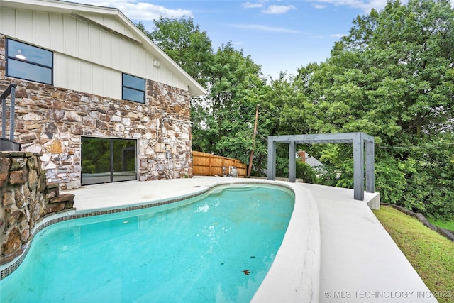 2936 E 75th St, Tulsa, OK 74136 - view of pool featuring a patio