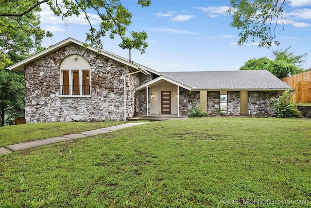 2936 E 75th St, Tulsa, OK 74136 - view of front of house featuring stone siding and a shingled roof