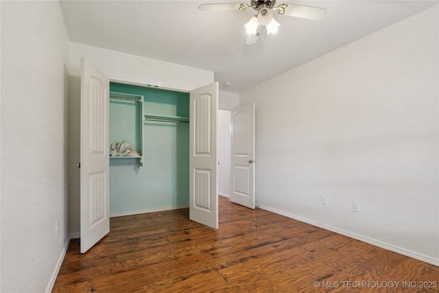 2110 S Javine Ct, Skiatook, OK 74070 - unfurnished bedroom featuring wood finished floors, a closet, and a ceiling fan