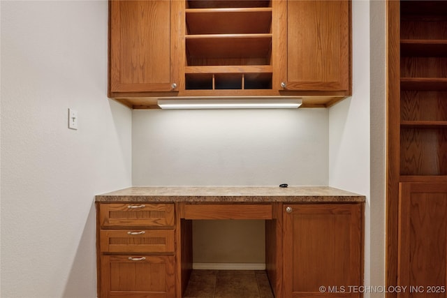 2110 S Javine Ct, Skiatook, OK 74070 - unfurnished office with built in study area and tile patterned floors