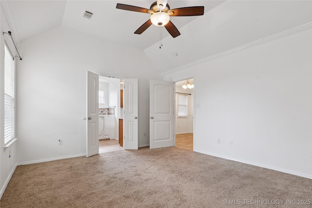2110 S Javine Ct, Skiatook, OK 74070 - unfurnished bedroom with lofted ceiling, light carpet, ensuite bath, a chandelier, and ceiling fan