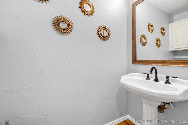 7416 S 109th E Ave, Tulsa, OK 74133 - bathroom with a sink and baseboards
