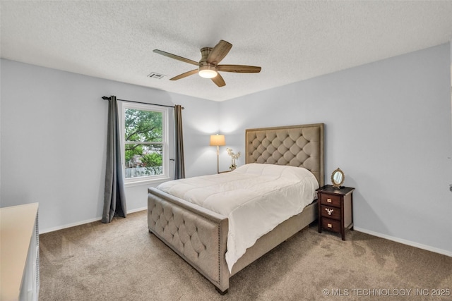 7416 S 109th E Ave, Tulsa, OK 74133 - bedroom featuring light carpet, a textured ceiling, and ceiling fan