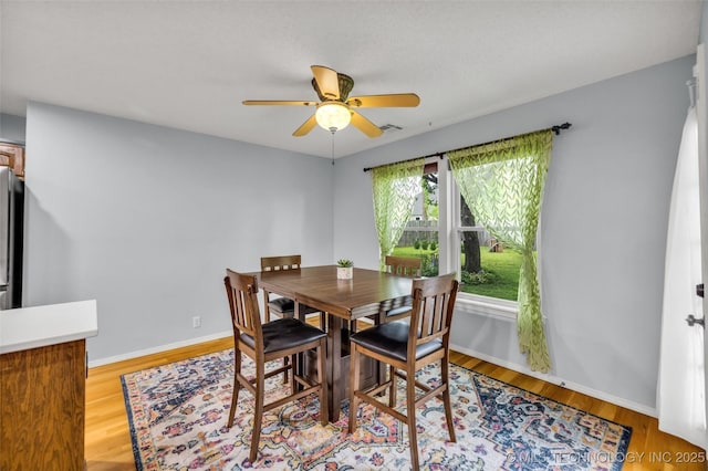 7416 S 109th E Ave, Tulsa, OK 74133 - dining area featuring ceiling fan and light wood finished floors