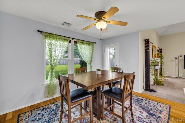 7416 S 109th E Ave, Tulsa, OK 74133 - dining space with a ceiling fan and wood finished floors