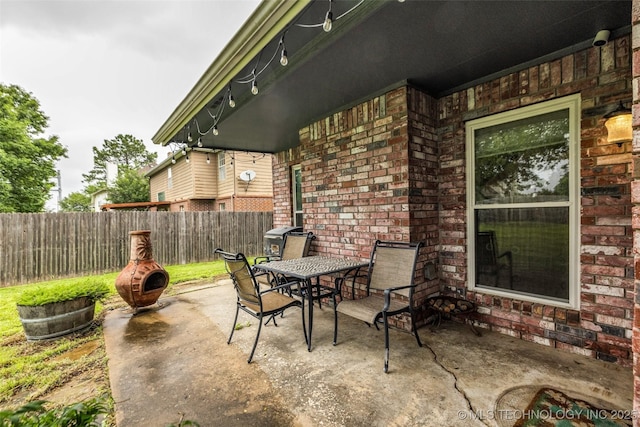 7416 S 109th E Ave, Tulsa, OK 74133 - view of patio featuring outdoor dining area and a grill