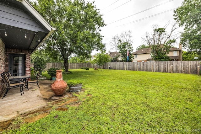 7416 S 109th E Ave, Tulsa, OK 74133 - fenced backyard featuring a patio area