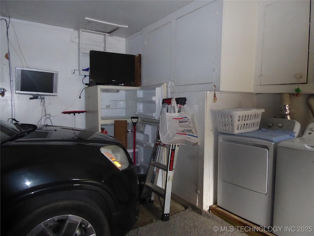 2414 S 126th E Ave, Tulsa, OK 74129 - laundry area featuring cabinet space and separate washer and dryer