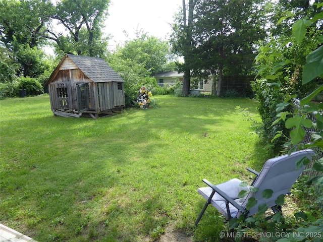 2414 S 126th E Ave, Tulsa, OK 74129 - view of yard with a storage shed