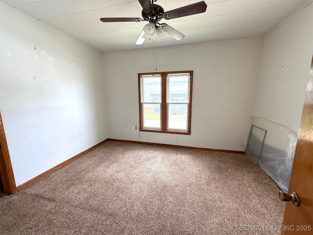 903 W Broadway St, Henryetta, OK 74437 - unfurnished room featuring carpet flooring, crown molding, and a ceiling fan