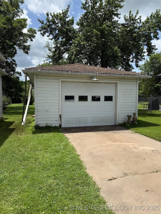 903 W Broadway St, Henryetta, OK 74437 - detached garage with concrete driveway