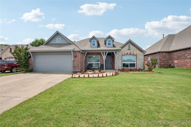 14220 S Vandalia Ave, Bixby, OK 74008 - view of front of house featuring a garage, a front lawn, driveway, and brick siding