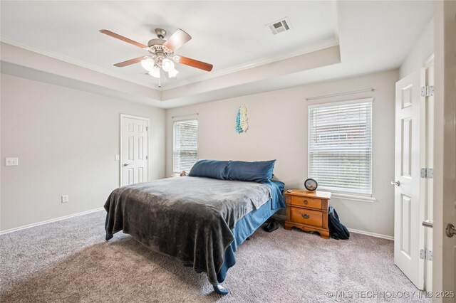 14220 S Vandalia Ave, Bixby, OK 74008 - bedroom featuring carpet floors, crown molding, a raised ceiling, and a ceiling fan