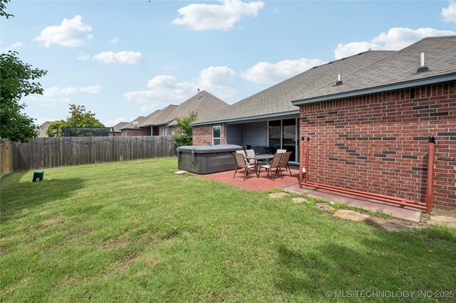 14220 S Vandalia Ave, Bixby, OK 74008 - fenced backyard with a hot tub and a patio