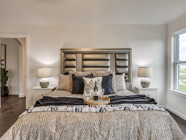 27742 E 109th St S, Coweta, OK 74429 - bedroom featuring multiple windows and dark wood finished floors