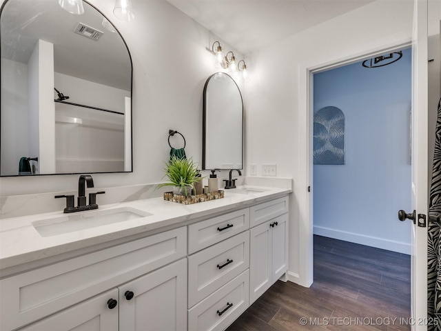 27742 E 109th St S, Coweta, OK 74429 - full bath with double vanity and wood finished floors