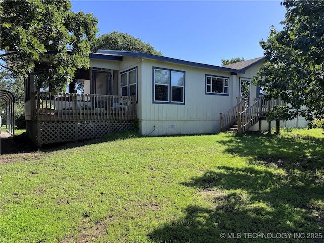 2399 County Road 1405, Skiatook, OK 74070 - view of side of property with crawl space, a lawn, and a deck