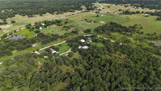 2399 County Road 1405, Skiatook, OK 74070 - view of property location with a heavily wooded area and a nearby body of water